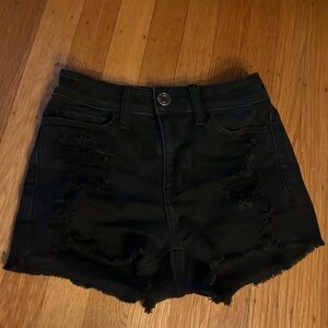 Black ripped shorts